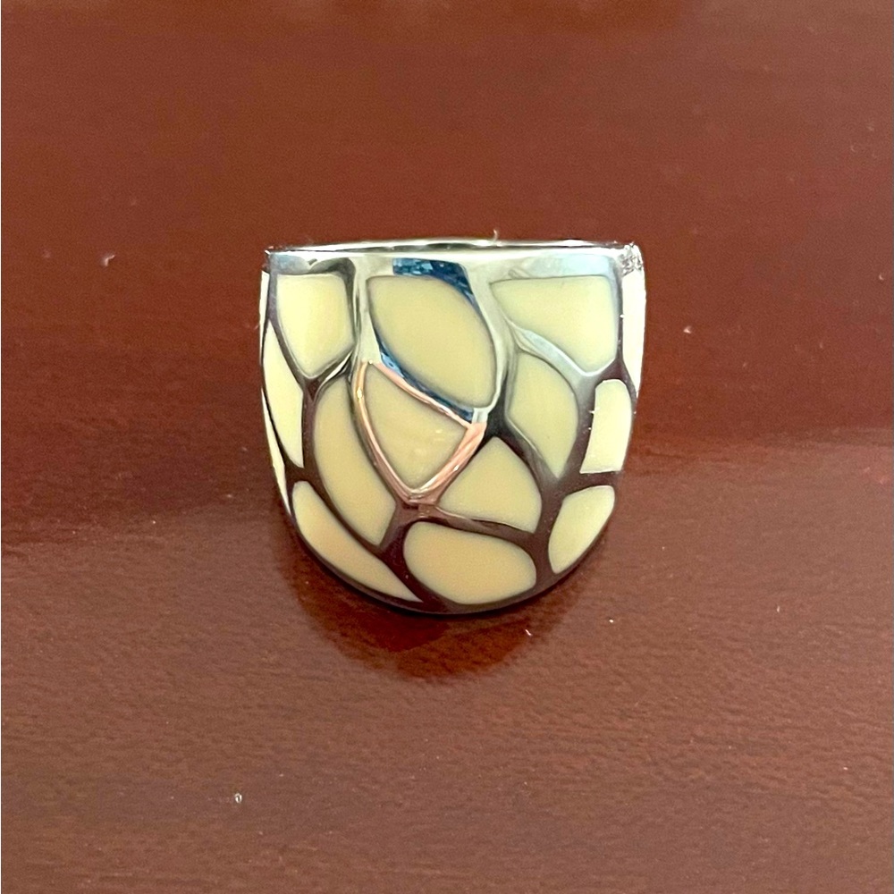 Pretty silver and white ring.